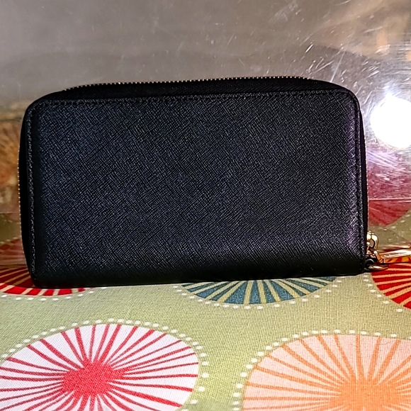 Jet Set Travel Large Pebbled Leather Wristlet - Picture 2 of 3